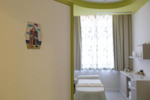 Posteľ alebo postele v izbe v ubytovaní Hotel Savoy
