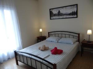 Postel nebo postele na pokoji v ubytování Estrella Rooms