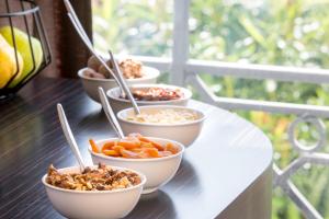 a group of bowls of food on a table at Best Western Hôtel Journel Antibes Juan-les-Pins in Antibes