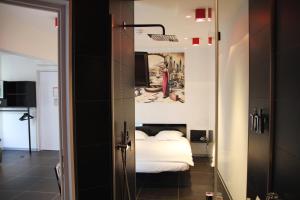 Letto o letti in una camera di Hotel Grey