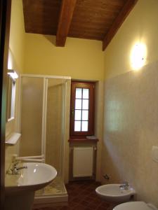 a bathroom with a sink and a shower at Agriturismo La Chabranda in Pomaretto