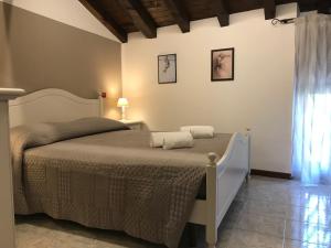 Ένα ή περισσότερα κρεβάτια σε δωμάτιο στο Anfite Apartments Aleardi