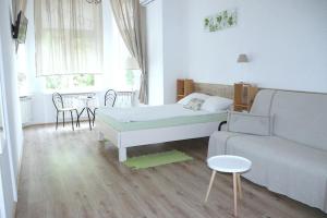 Postel nebo postele na pokoji v ubytování Maison Blanche Kyiv city center + 37 fotografií