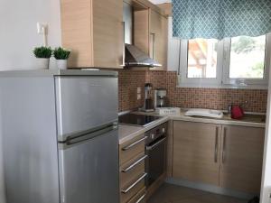 A kitchen or kitchenette at Anastasia's maison