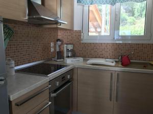A kitchen or kitchenette at Anastasia's maison