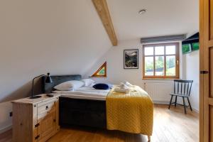 Posteľ alebo postele v izbe v ubytovaní Biała Owieczka B&B Szczyrk