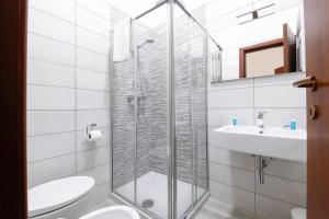 Koupelna v ubytování Lupomonaco Rooms