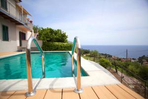 a swimming pool on a balcony of a house at Ca Mè in Monterosso al Mare