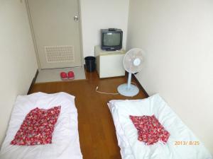 Postel nebo postele na pokoji v ubytování Hotel Diamond