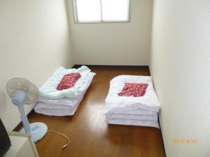 Postel nebo postele na pokoji v ubytování Hotel Diamond