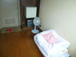 Postel nebo postele na pokoji v ubytování Hotel Diamond