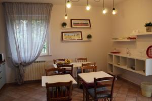 A restaurant or other place to eat at Villa Lucia B&B