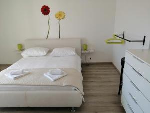 Posteľ alebo postele v izbe v ubytovaní Apartment Roky
