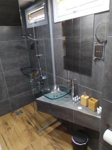 Koupelna v ubytování Takis apartments + 16 fotografií