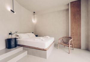 A bed or beds in a room at Monastery Estate Retreat