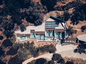 an aerial view of a house on a mountain at Monastery Estate Retreat in Sougia
