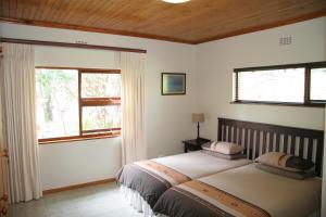 מיטה או מיטות בחדר ב-Hildesheim Guest Lodge