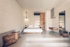 A bed or beds in a room at Monastery Estate Retreat