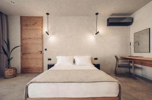 A bed or beds in a room at Monastery Estate Retreat