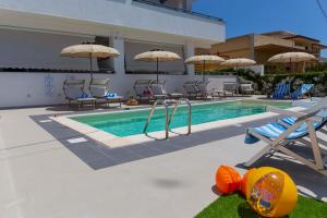 La pileta dentro o cerca de MareinSicilia: Talia Residence