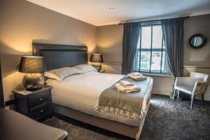 Кровать или кровати в номере N'ista Boutique Rooms Birkdale, Southport