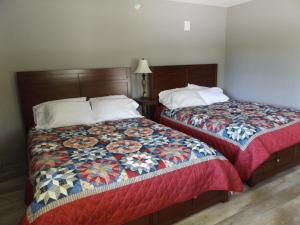 Tempat tidur dalam kamar di Big Spirit Resort