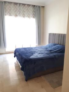 Postel nebo postele na pokoji v ubytování Dar Lazraq