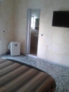 Postel nebo postele na pokoji v ubytování Bed And Breakfast Il Subacqueo