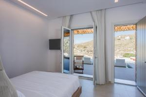 Ein Bett oder Betten in einem Zimmer der Unterkunft Super Paradise Hotel