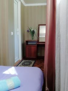 Voodi või voodid majutusasutuse Guest House Carpediem toas