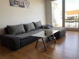 Posezení v ubytování Apartment Barbin