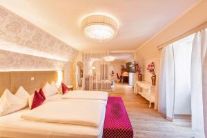 Posteľ alebo postele v izbe v ubytovaní Hotel Mader