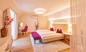 Posteľ alebo postele v izbe v ubytovaní Hotel Mader