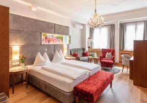 Posteľ alebo postele v izbe v ubytovaní Hotel Mader