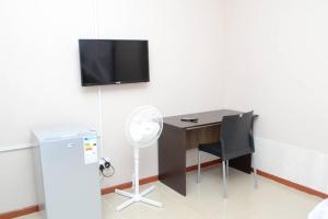 TV a/nebo společenská místnost v ubytování Delight Lodge