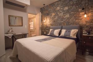 Posteľ alebo postele v izbe v ubytovaní Eftopia Beachfront 2-bedrooms apartment