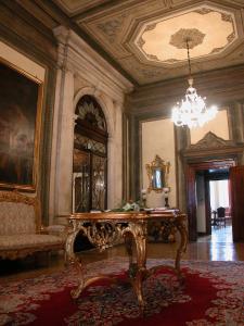 Uma área de estar em Hotel Palazzo Abadessa