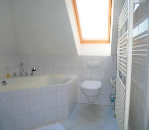 Koupelna v ubytování Ferienwohnung mit Flair + 15 fotografií