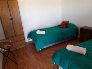 Katil atau katil-katil dalam bilik di Hostal Las Kañas