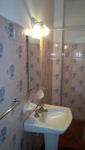 Ванная комната в Hotel del Faro