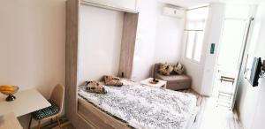 เตียงในห้องที่ White Flat Batumi