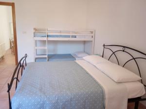 Poschodová posteľ alebo postele v izbe v ubytovaní Casa Eleonora
