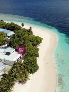 an aerial view of a resort on a tropical island at Thundi Village & Spa in Maalhos