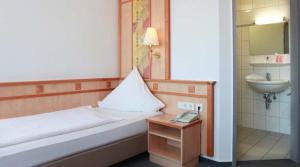 Koupelna v ubytování Hotel Wetterau - Self-Check-In
