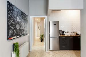 Kuchyň nebo kuchyňský kout v ubytování So Young Hostel