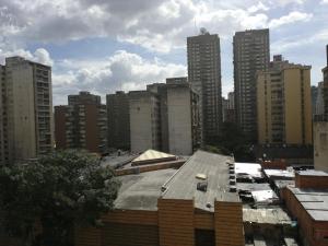 a view of a city skyline with tall buildings at Hotel Lider in Caracas