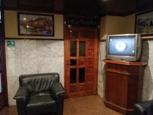A television and/or entertainment center at Hotel Lider