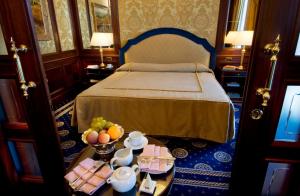 Кровать или кровати в номере Hotel Simplon