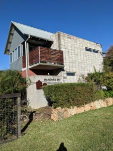 a building with a balcony on the side of it at Hanover Bay Apartments in Albany