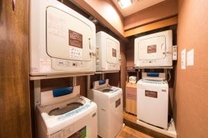 a room with several machines and othermedical equipment at Dormy Inn Express Mikawaanjo in Anjomachi